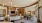 a large room with a pool table and a tv