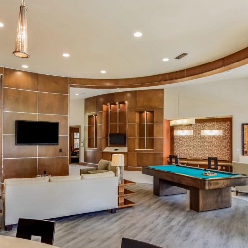 Enjoy our resident-only features a large room with a pool table and a tv