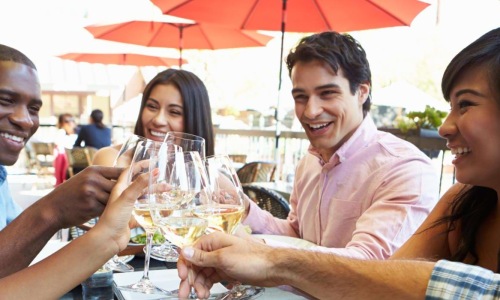 a group of people eating at a table