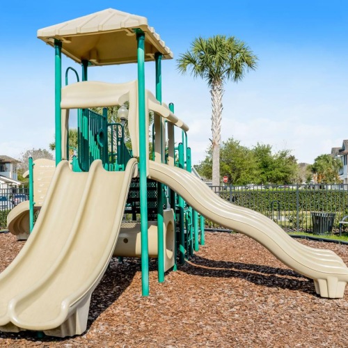 A perfect fit for the whole family a playground with a slide