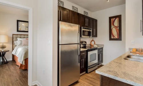 a kitchen with a refrigerator