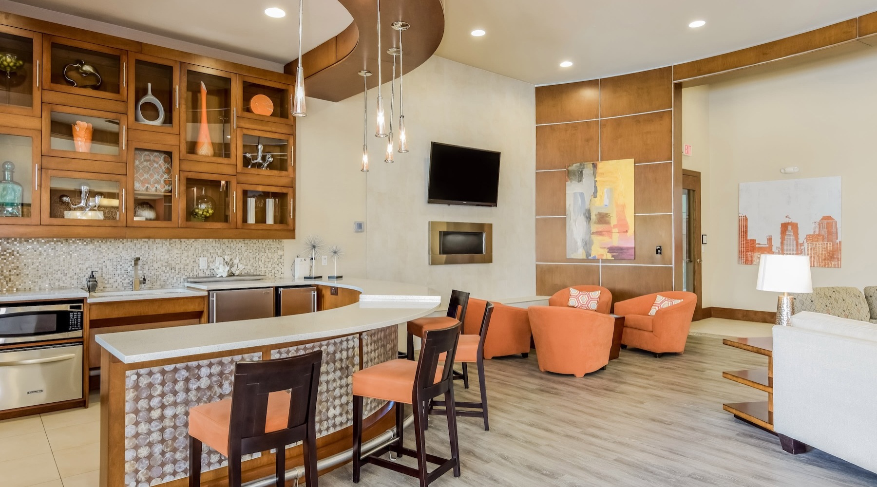 clubhouse with chandeliers and seating