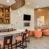 clubhouse with chandeliers and seating